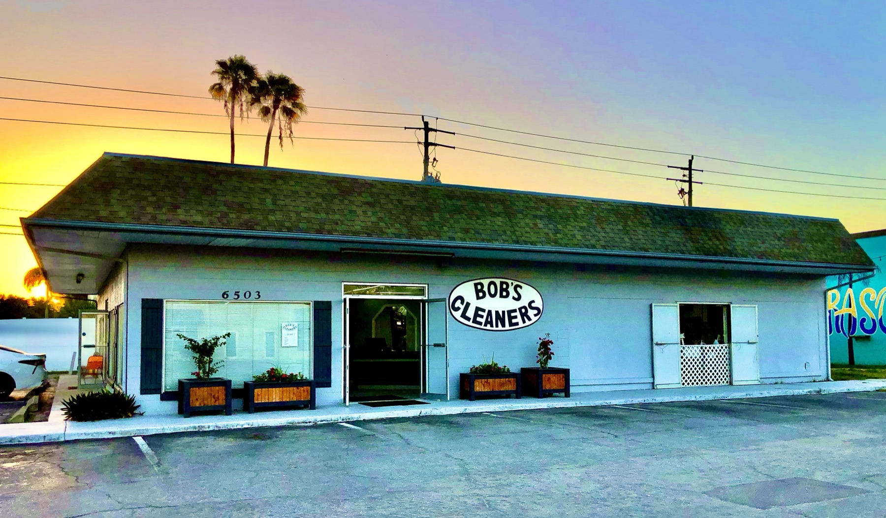 Bob's Cleaners storefront at sunset