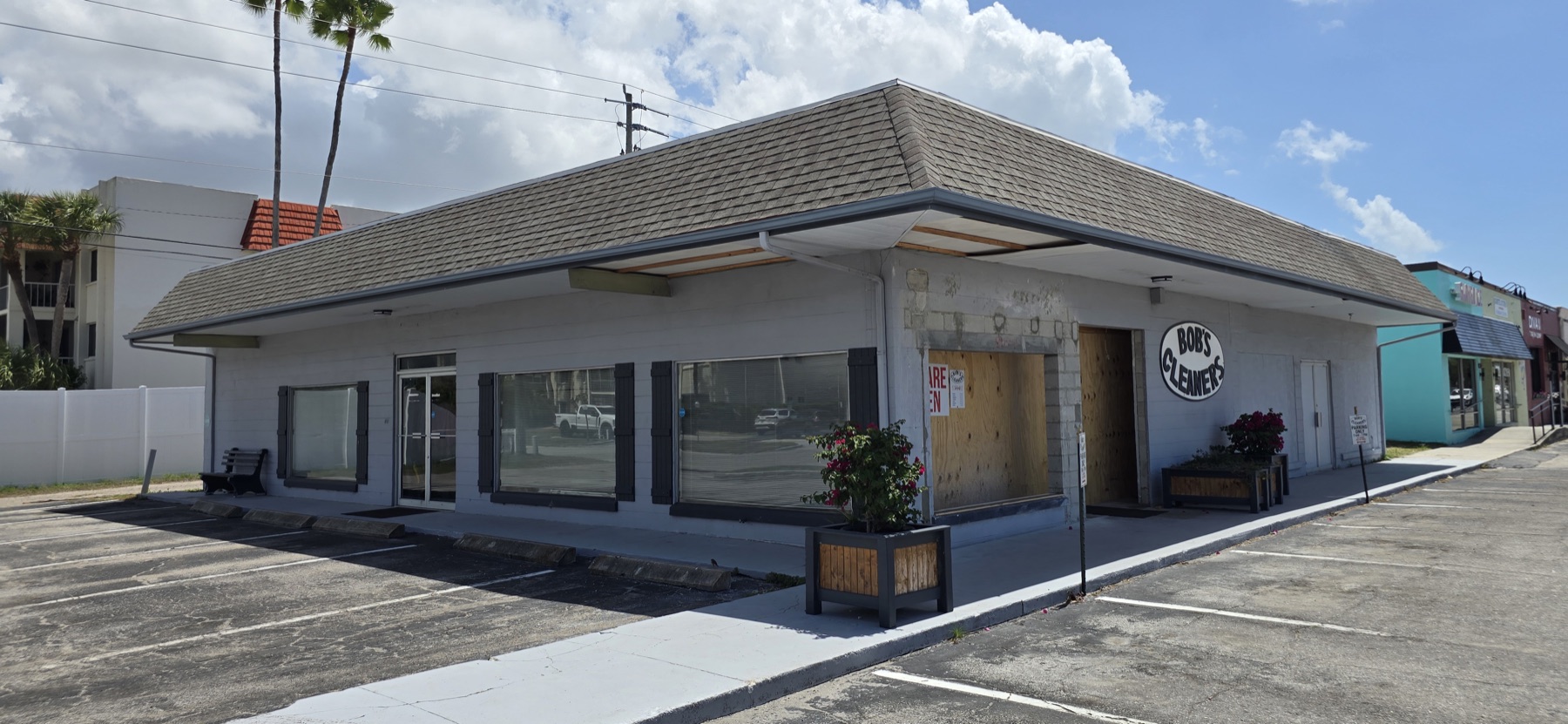 Parking area and exterior of Bob's Laundry and Dry Cleaning