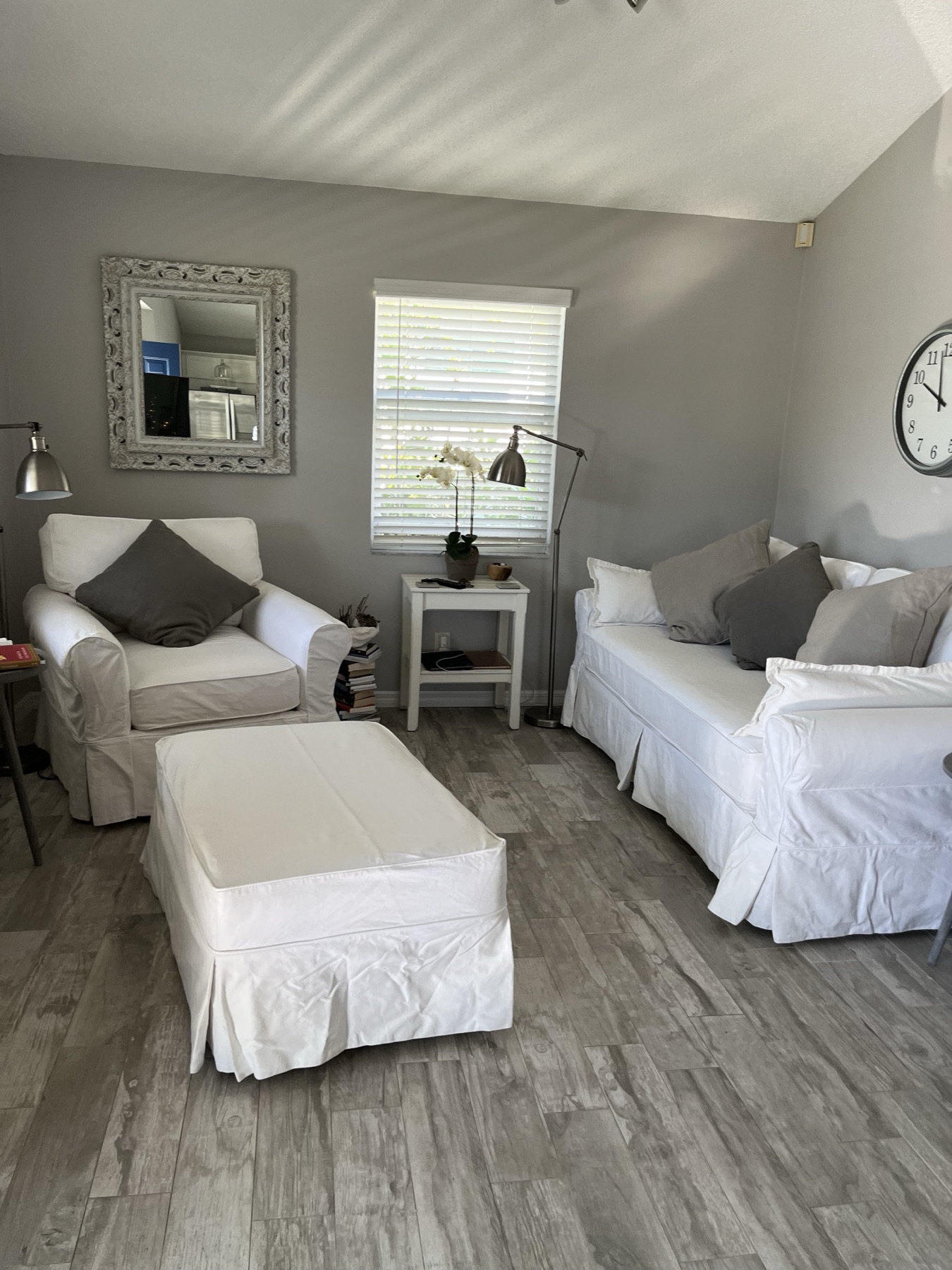 Fresh light-colored upholstered seating in a tidy interior