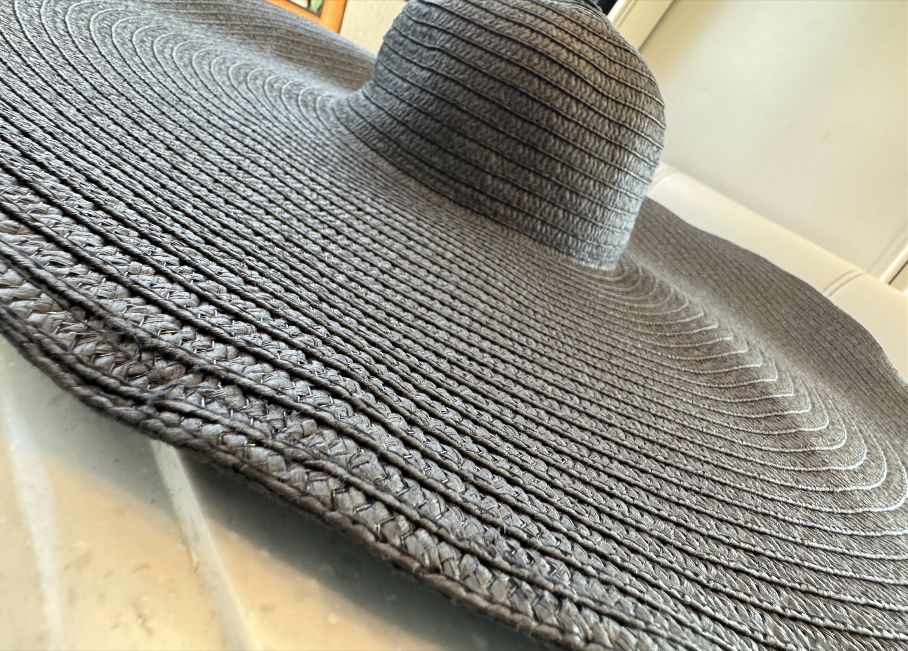 Close detail of a woven hat representing special garment care